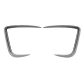 Glossy carbon fiber trims with a sharp, modern contour design.