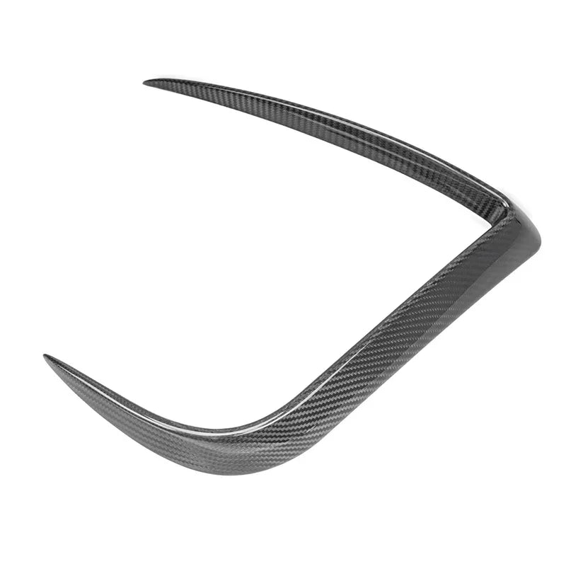 Single carbon fiber trim showing smooth curvature and premium finish.