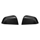 Genuine carbon fibre rear view mirror covers for the 2025 Tesla Model Y Juniper, shown as a high-gloss pair on a white background.