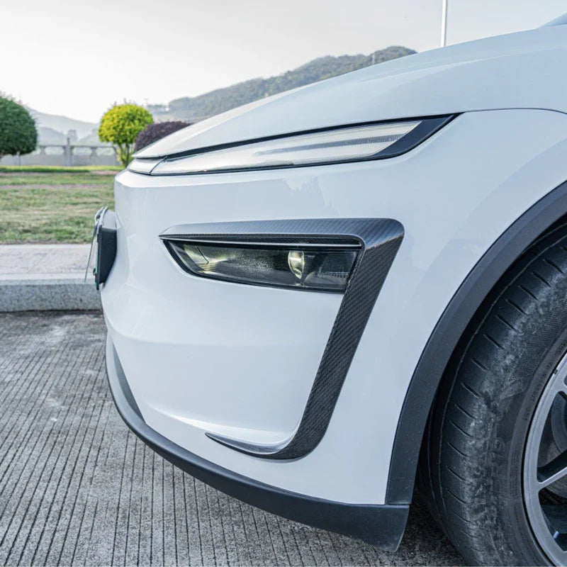 Side angle showing carbon trim adding aggressive front styling.