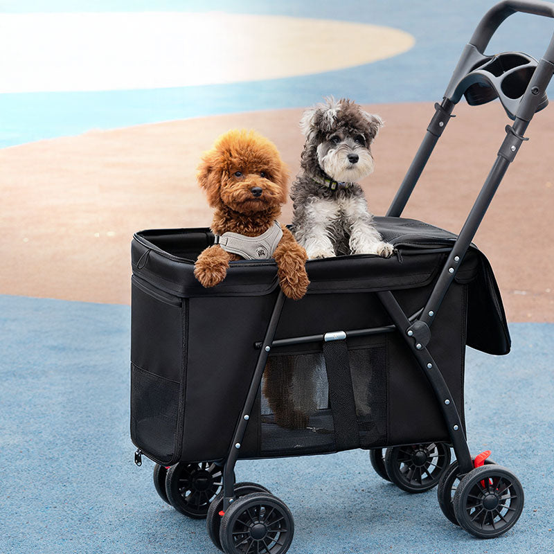 Black foldable pet stroller with mesh sides, four double wheels, and a handlebar featuring cup holders.