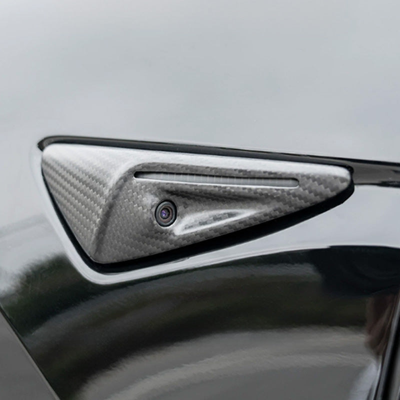 Close-up showing camera opening and seamless carbon fiber integration.