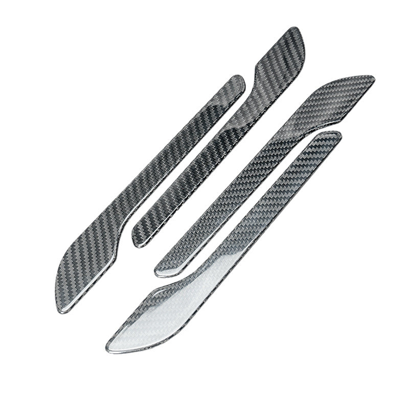 Real carbon fibre door handle wrap covers for Tesla Model 3 (2024–2025) and Model Y (2025 Juniper), shown in a four-piece set on a white background.