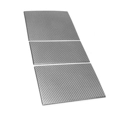 Three-piece carbon fiber panels with clean cuts and glossy texture.