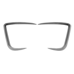 Glossy carbon fiber trims with a sharp, modern contour design.