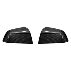 Genuine carbon fibre rear view mirror covers for the 2025 Tesla Model Y Juniper, shown as a high-gloss pair on a white background.