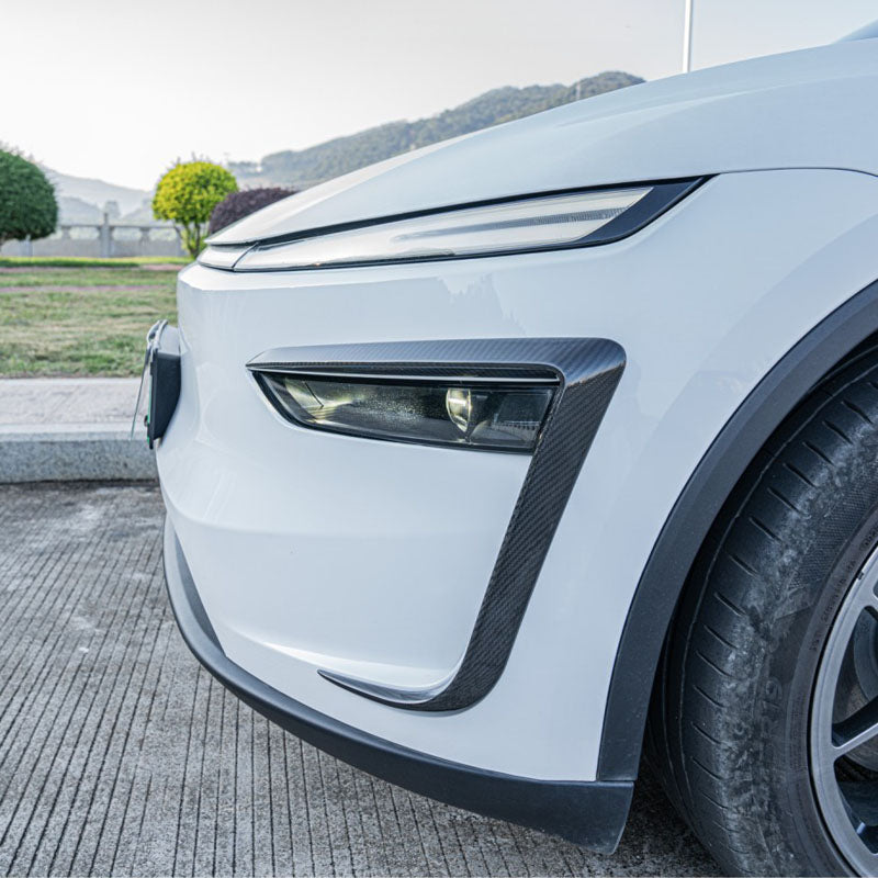 Side angle showing carbon trim adding aggressive front styling.