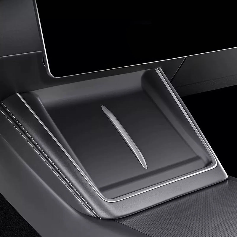 Black silicone liner protector installed on the wireless charging tray of Model Y L