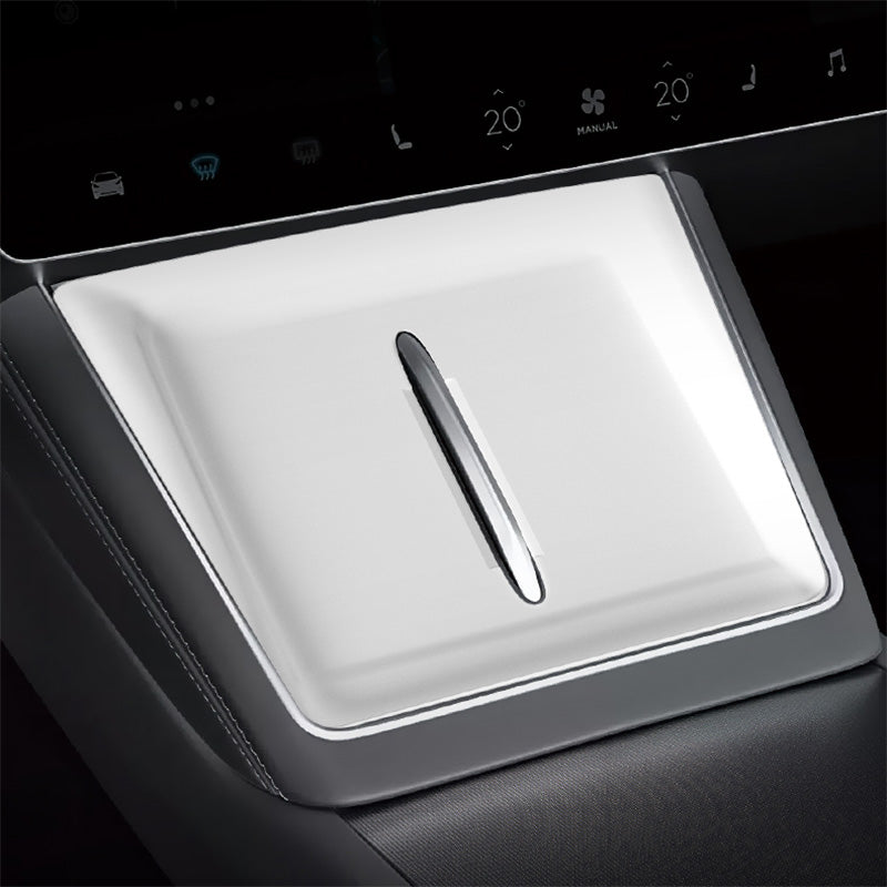 White silicone liner protector installed on the wireless charging tray of Model Y L